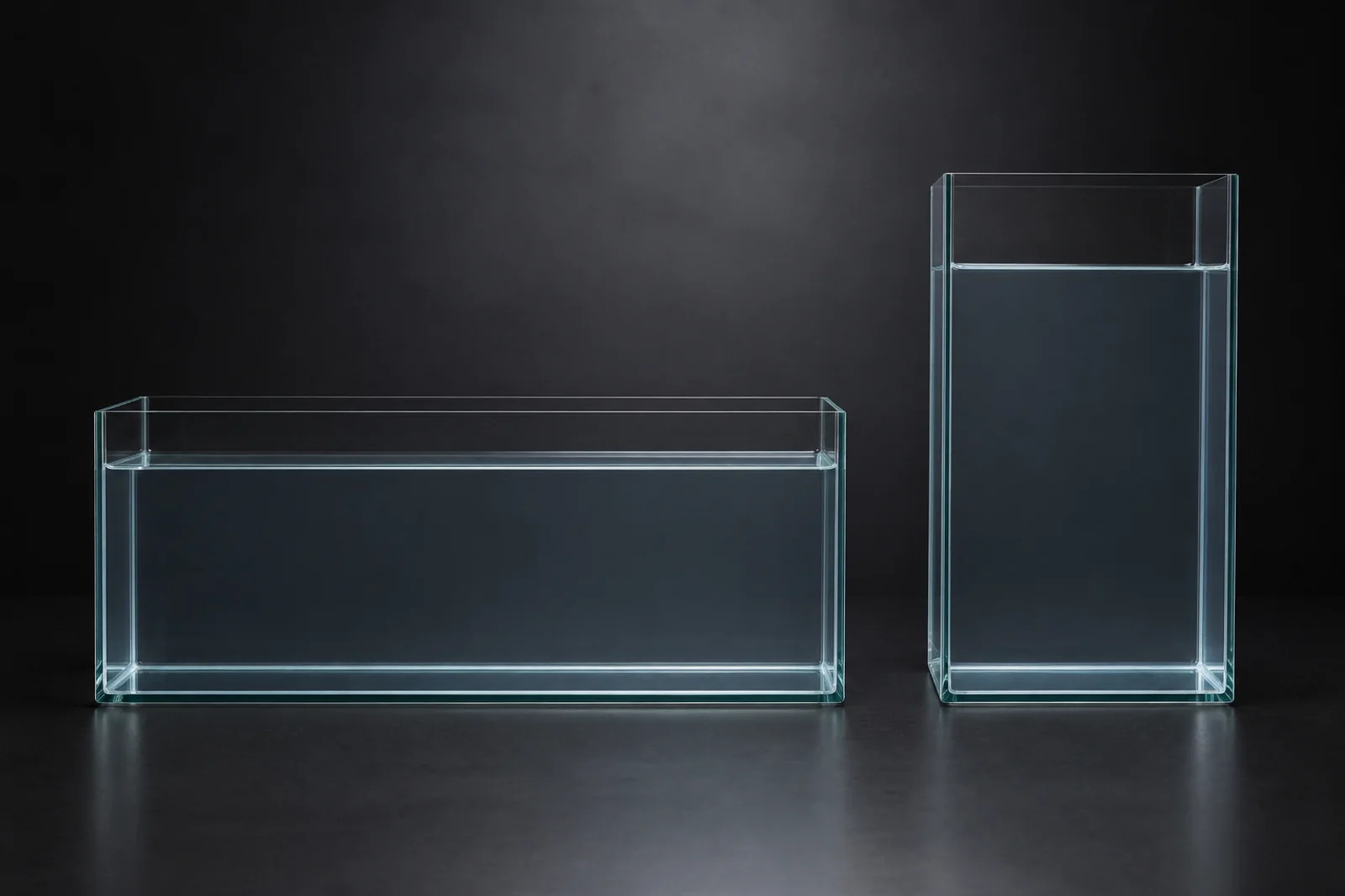 Two aquariums of equal volume side by side, one long and shallow, the other tall and narrow